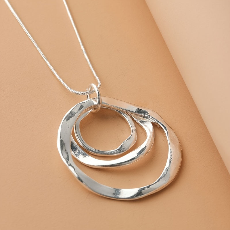 Silver Triple Ring Pendant Necklace: Stylish and Versatile Jewelry