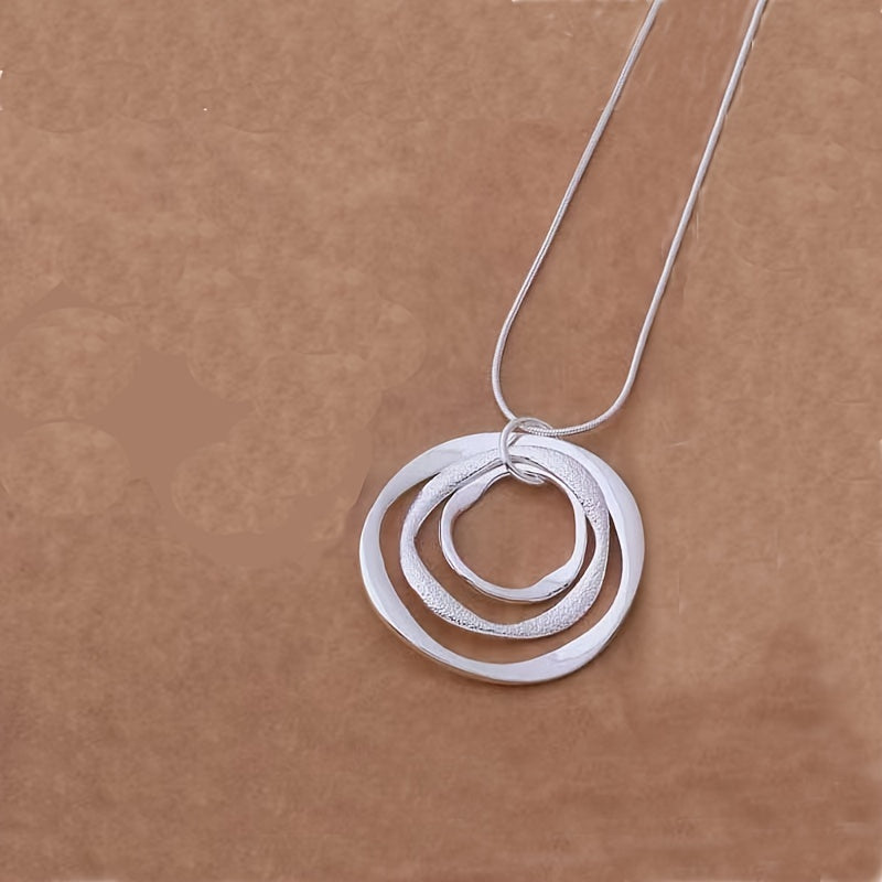 Silver Triple Ring Pendant Necklace: Stylish and Versatile Jewelry