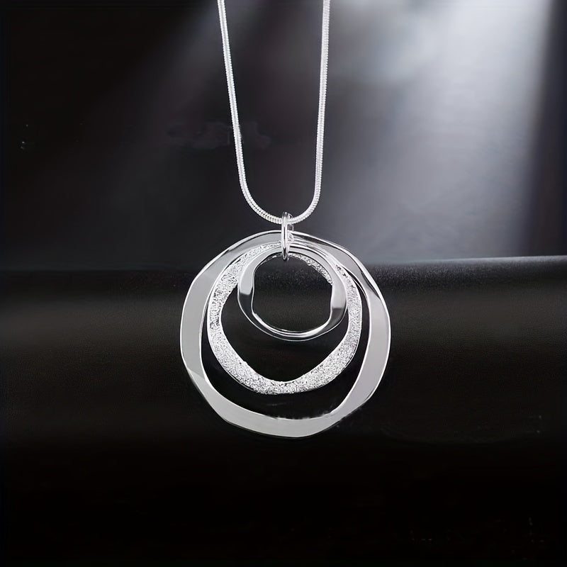 Silver Triple Ring Pendant Necklace: Stylish and Versatile Jewelry