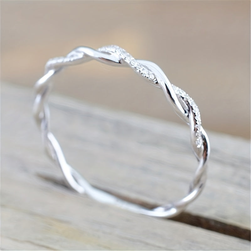 Fashionable Ring with Twist Design and Artificial Diamond Encrusting