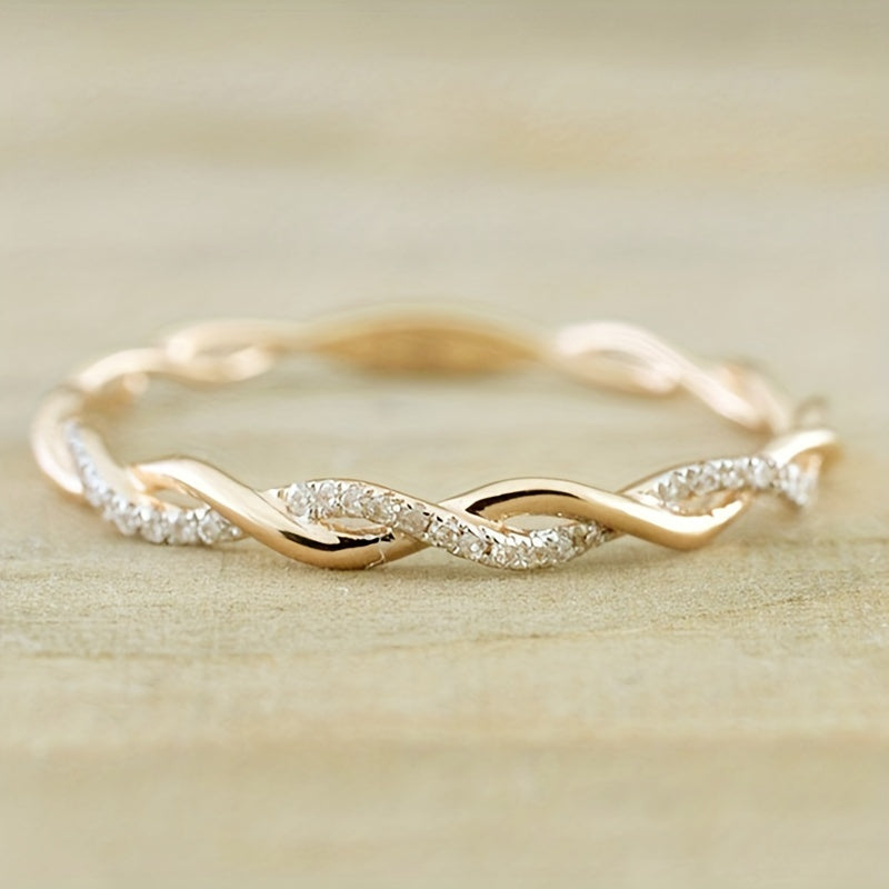 Fashionable Ring with Twist Design and Artificial Diamond Encrusting